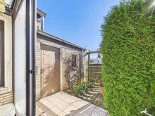 r�ckwertige Zugang zur Garage Solides Einfamilienhaus mit reichlich Potenzial