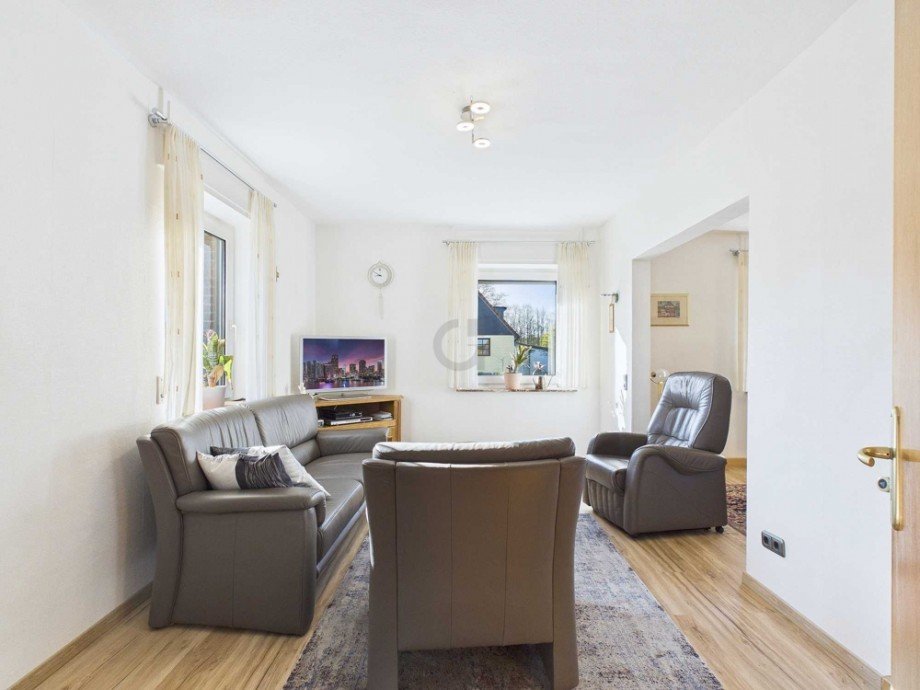 Blick ins Wohnzimmer Einfamilienhaus H�rtgenwald / Gro�hau